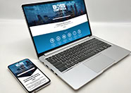 A laptop and smartphone displaying the Boss Controls website on a white background. The website features a cityscape with digital overlays, a bold header reading 'Boss Controls, and sections highlighting services related to smart building solutions. The design is responsive, clean, and professional.